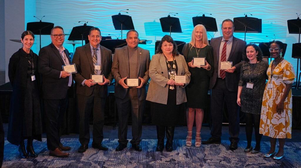 Superintendents accepting an award